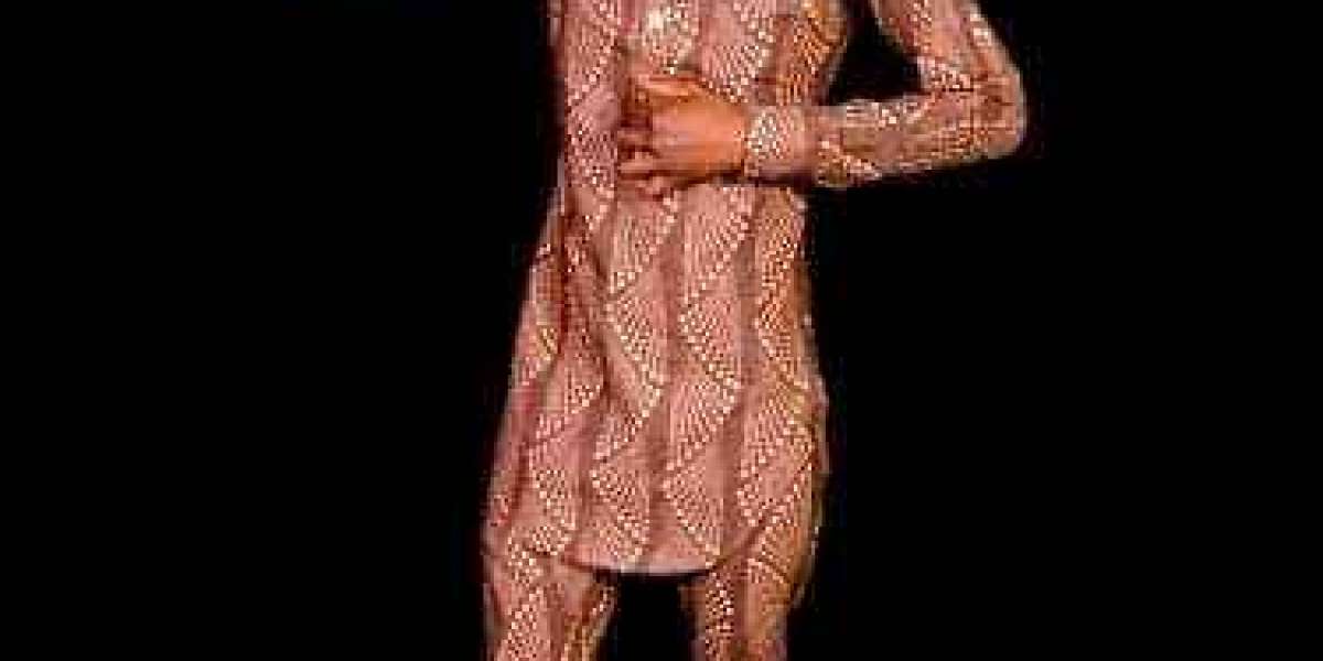 FASHION AND DESIGN FOR AFRICAN MEN IN MODELING USING KITENGE SYSTEM.