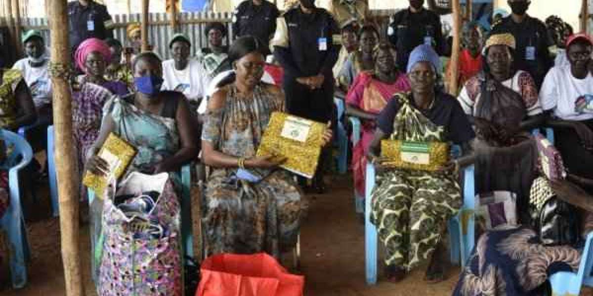 Rwandan female Police peacekeepers donate clothes to displaced women in South Sudan